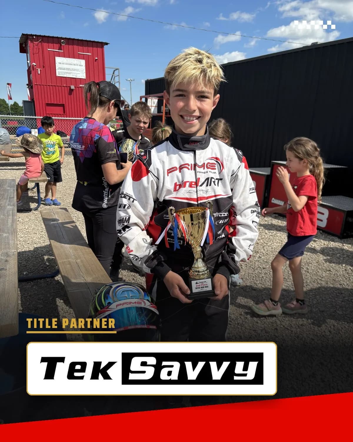 Damian holding his trophy, presented by title partner TekSavvy